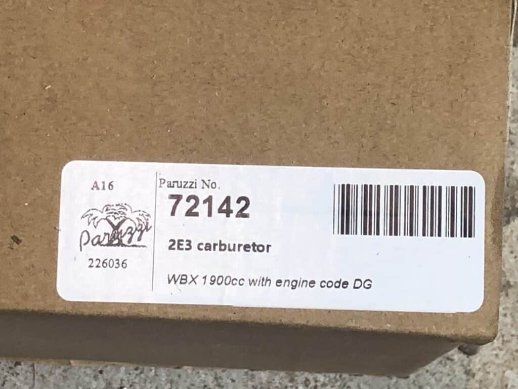 The label on the shipping box showing the part number, and the description which indicates this Paruzzi 2e3 carburettor is configured for the Waterboxer 1900cc DG series engine